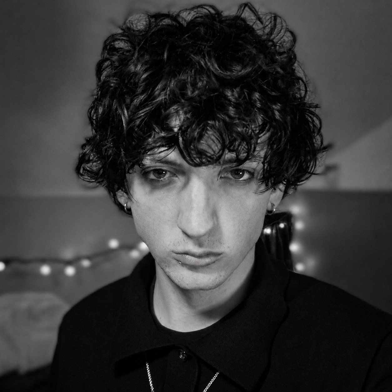 Black-and-white headshot of James Clancy